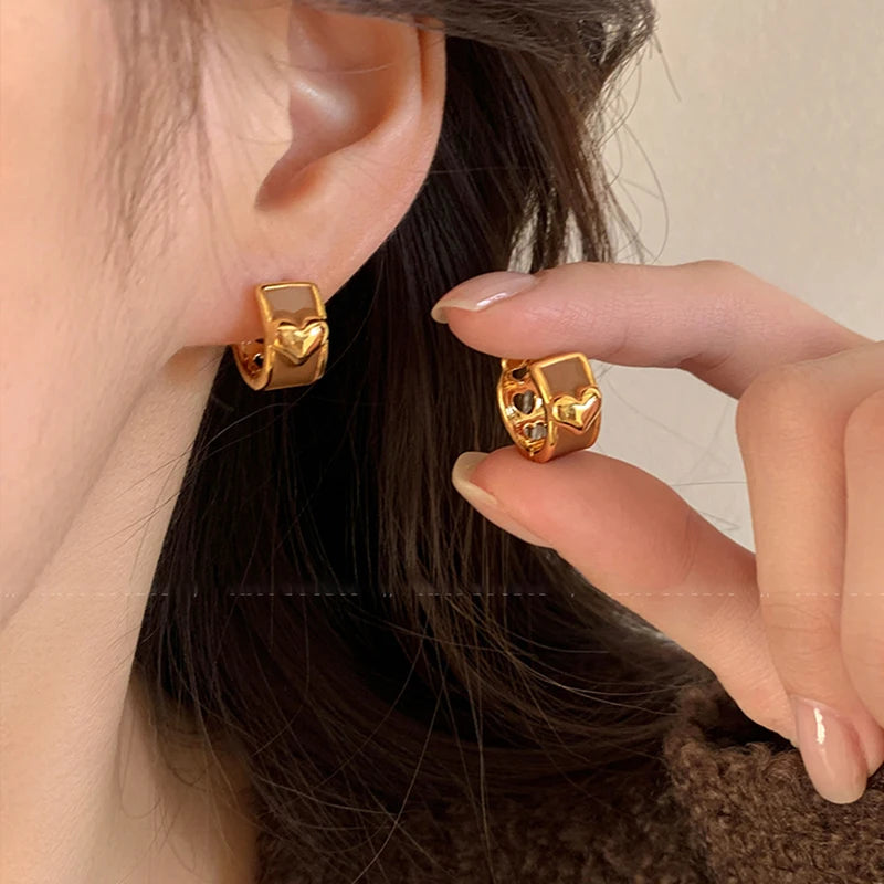 2025 Girl’s New French Enamel Metal Heart shaped Ear Buckles   ChatGPT said: ChatGPT أقراط مشبك على شكل قلب من المينا المعدني بتصميم فرنسي جديد لعام 2025 للفتيات