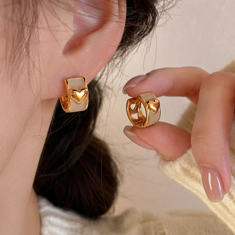 2025 Girl’s New French Enamel Metal Heart shaped Ear Buckles   ChatGPT said: ChatGPT أقراط مشبك على شكل قلب من المينا المعدني بتصميم فرنسي جديد لعام 2025 للفتيات