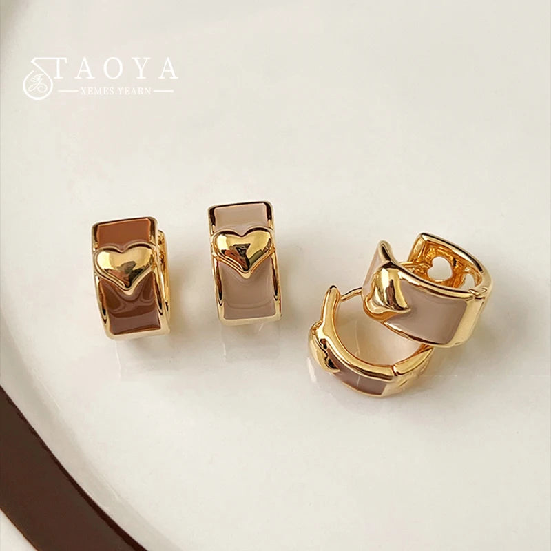 2025 Girl’s New French Enamel Metal Heart shaped Ear Buckles   ChatGPT said: ChatGPT أقراط مشبك على شكل قلب من المينا المعدني بتصميم فرنسي جديد لعام 2025 للفتيات